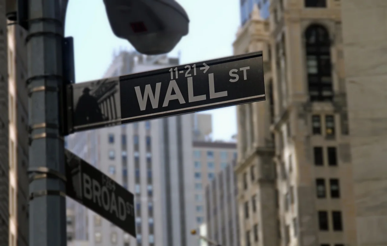 Wall Street and Broad Street signs in New York's Financial District
